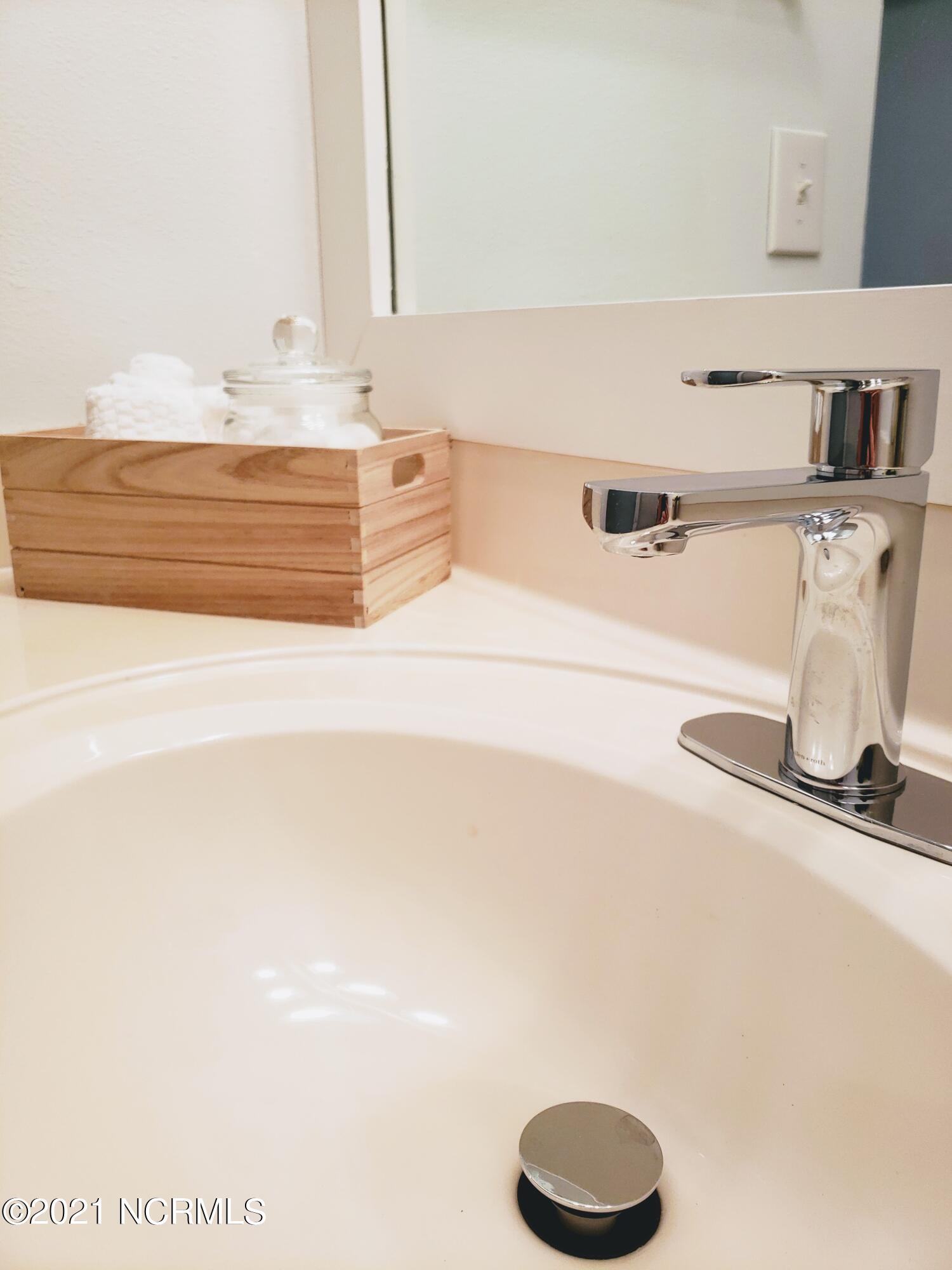 155 Royal Poste Road, Unit 3002 Sunset Beach, NC 28468 - Photo 9 of 20 Spacious Bathroom Vanities. New Chrome Lavatory Valves in Bathrooms.