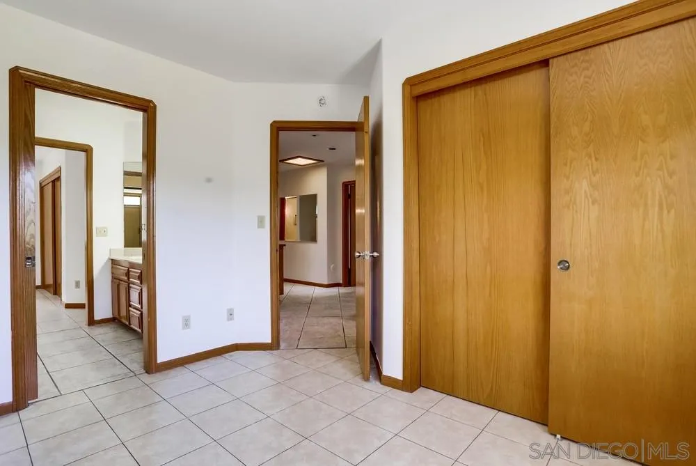 3690 Lupine Lane Fallbrook, CA 92028 - Photo 22 of 37 a view of a bathroom with a glass door