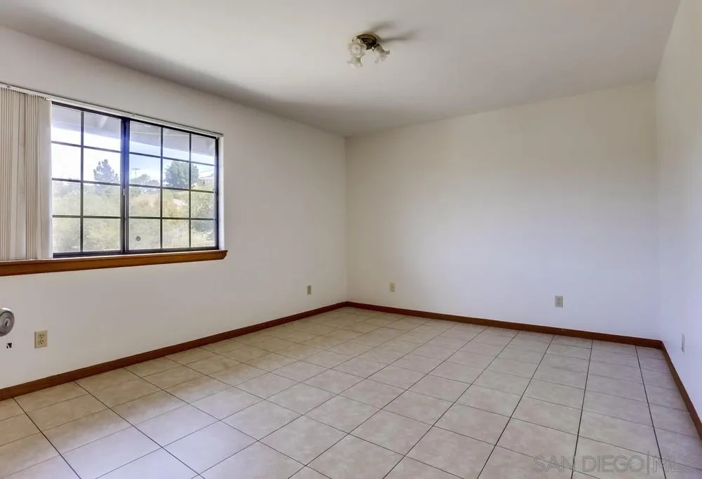 3690 Lupine Lane Fallbrook, CA 92028 - Photo 23 of 37 a view of an empty room with a window