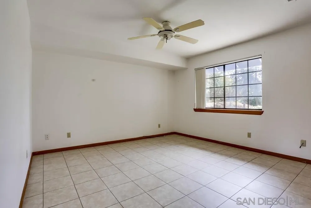 3690 Lupine Lane Fallbrook, CA 92028 - Photo 25 of 37 a view of an empty room with a window