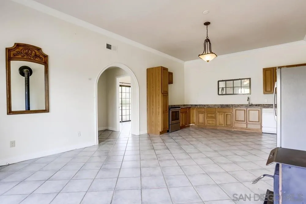 3690 Lupine Lane Fallbrook, CA 92028 - Photo 29 of 37 a view of a hallway with entryway wooden floor and front door