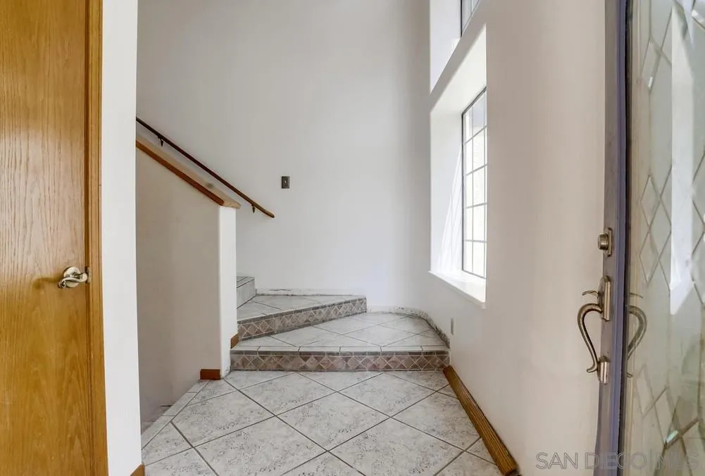 3690 Lupine Lane Fallbrook, CA 92028 - Photo 3 of 37 a view of a hallway to a bedroom
