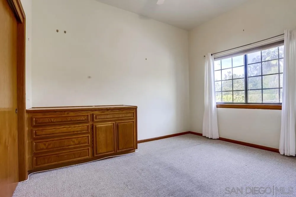 3690 Lupine Lane Fallbrook, CA 92028 - Photo 31 of 37 an empty room with windows