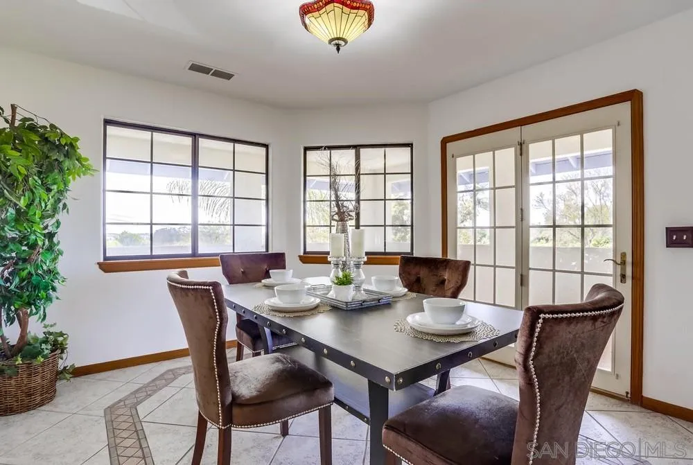 3690 Lupine Lane Fallbrook, CA 92028 - Photo 8 of 37 a view of a dining room with furniture window and outside view