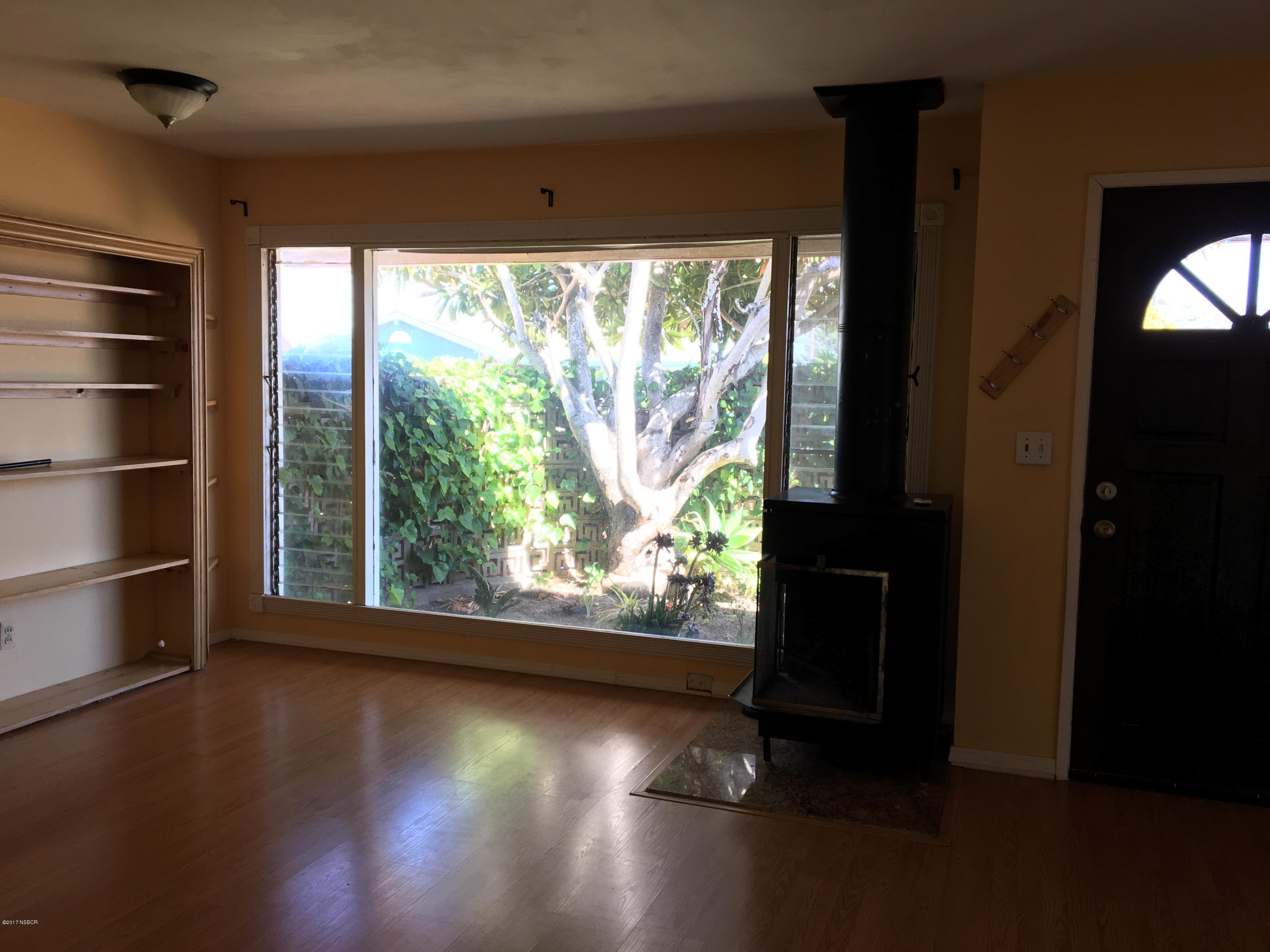 3407 Via Dona Lompoc, CA 93436 - Photo 3 of 11 a view of empty room with wooden floor and fan