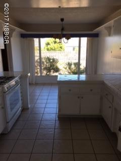 3407 Via Dona Lompoc, CA 93436 - Photo 5 of 11 a kitchen with a window a sink and a stove