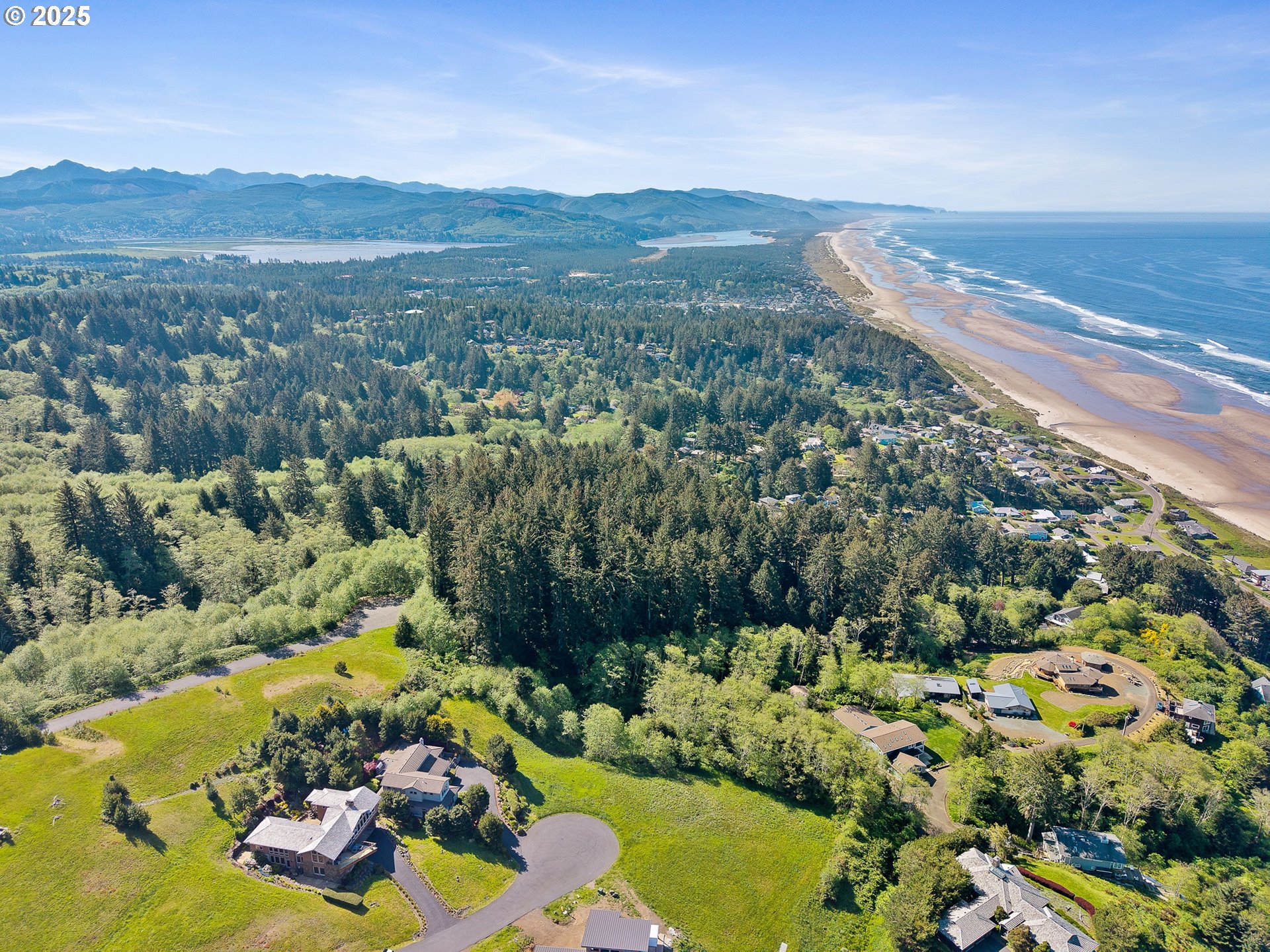Tides Trail Nehalem, OR 97131 - Photo 12 of 16 an aerial view of a house with a garden