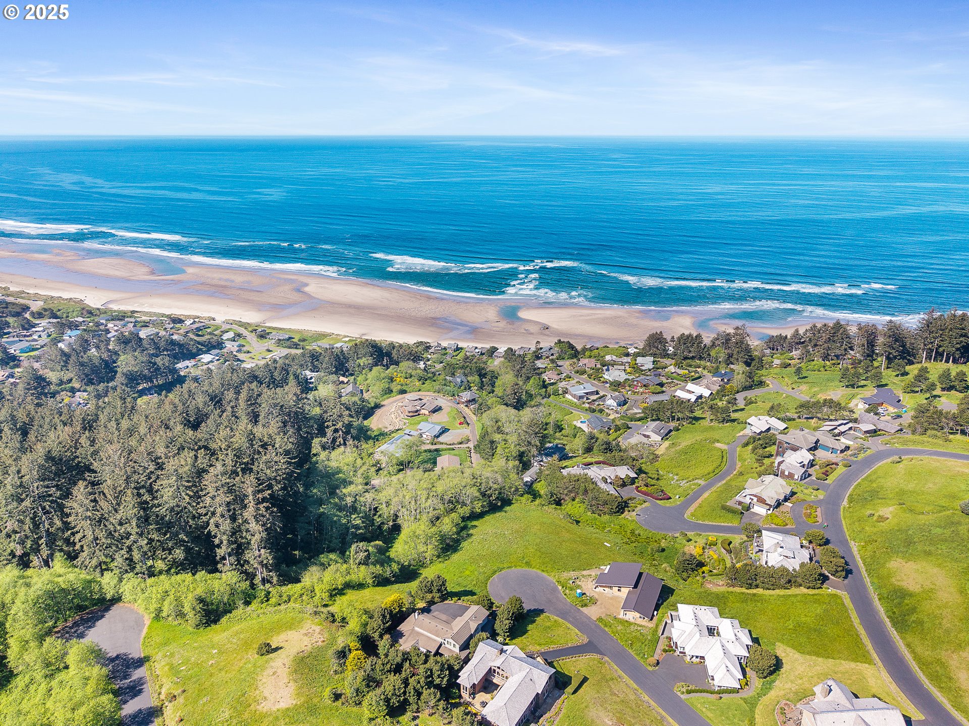 Tides Trail Nehalem, OR 97131 - Photo 13 of 16 a view of a city with an ocean