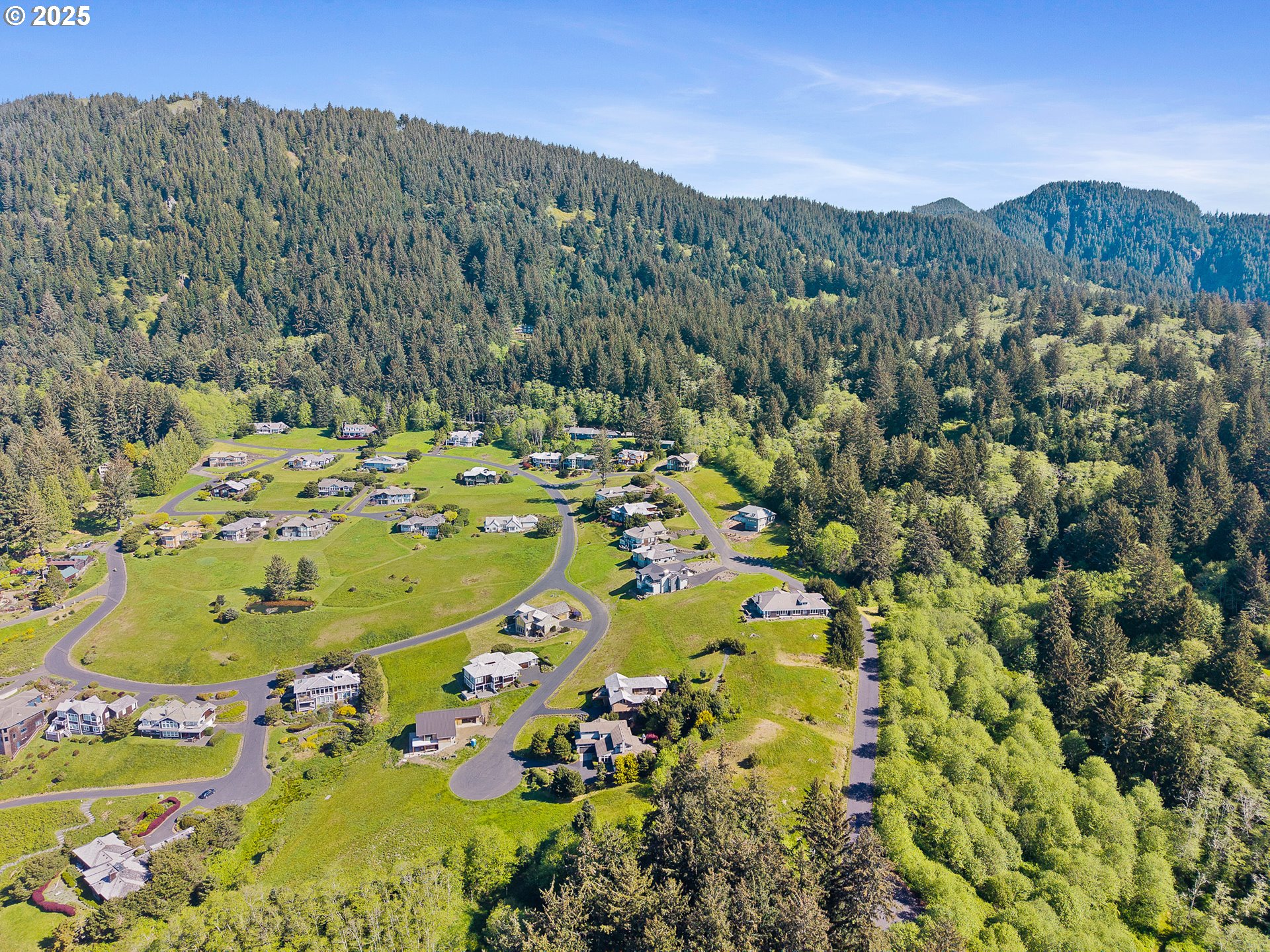 Tides Trail Nehalem, OR 97131 - Photo 15 of 16 a view of a swimming pool with a yard