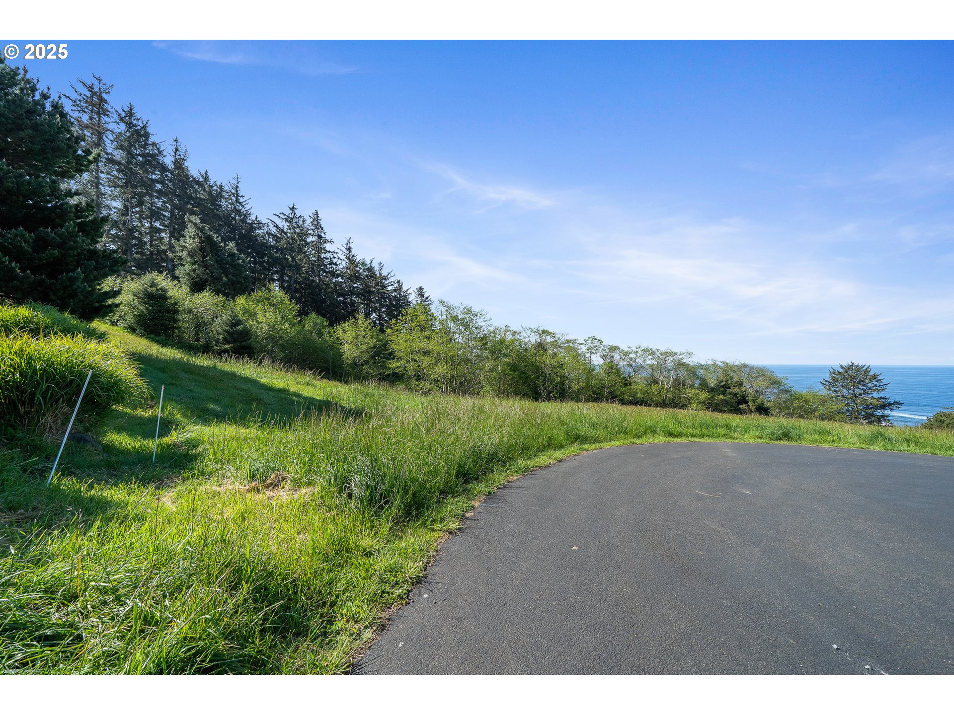 Tides Trail Nehalem, OR 97131 - Photo 2 of 16 a view of a beach and a yard
