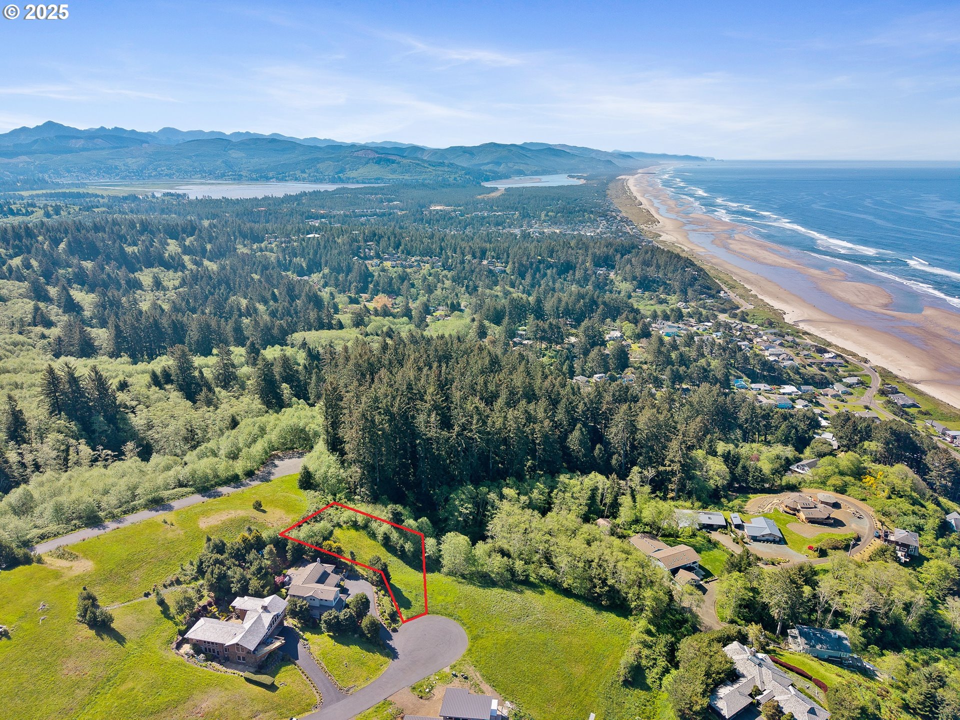 Tides Trail Nehalem, OR 97131 - Photo 6 of 16 an aerial view of a house with a garden