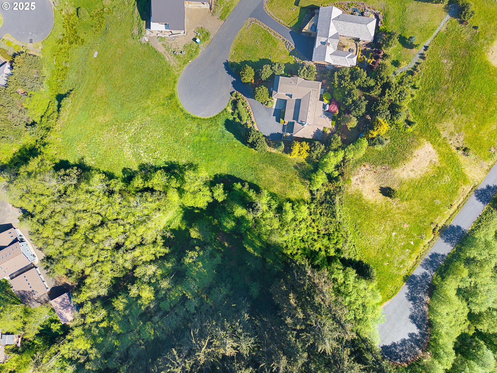 Tides Trail Nehalem, OR 97131 - Photo 8 of 16 an aerial view of residential house with swimming pool and swimming pool