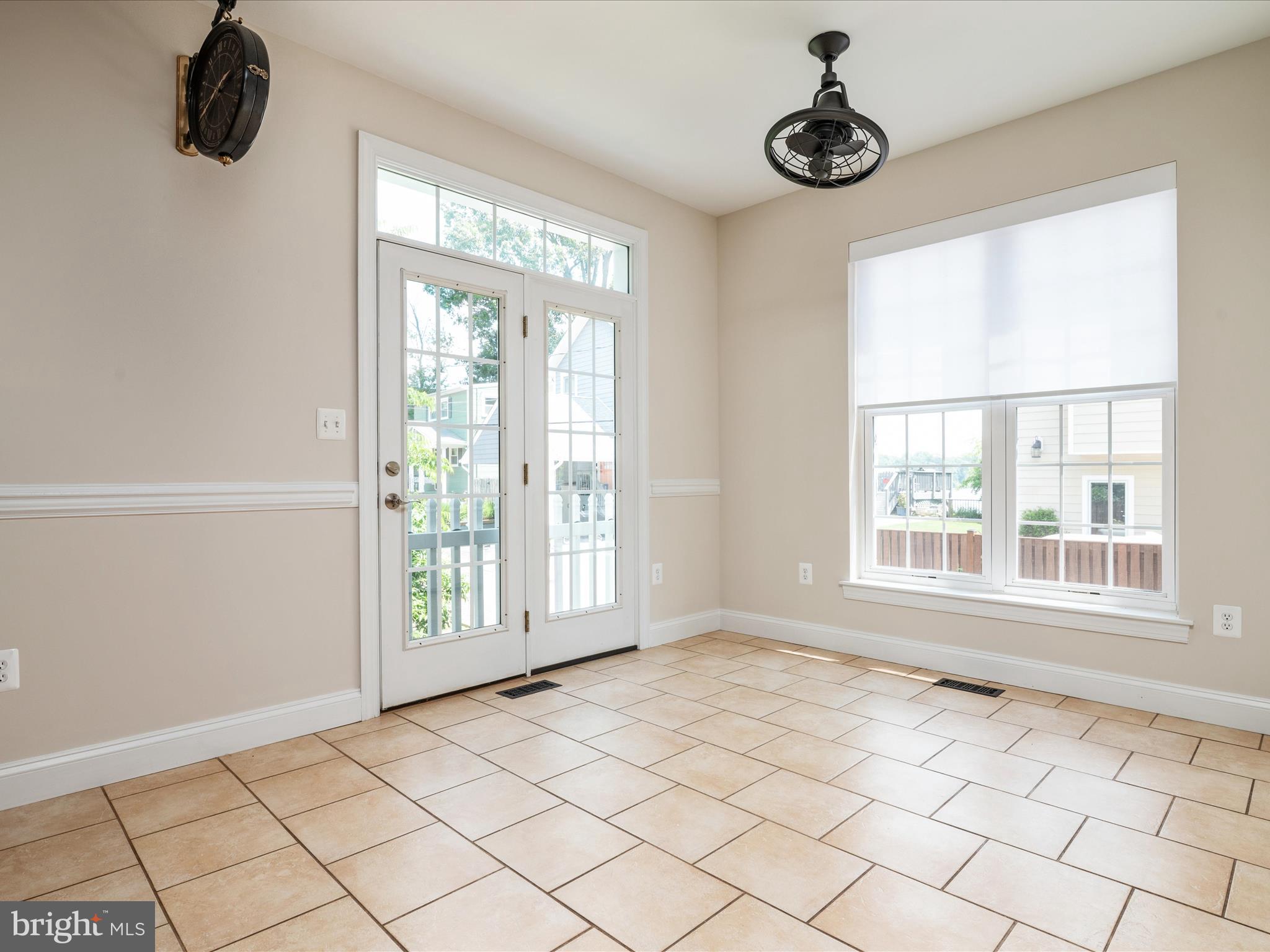23 Elm Road Riva, MD 21140 - Photo 19 of 66 a view of an empty room with a window and a kitchen area