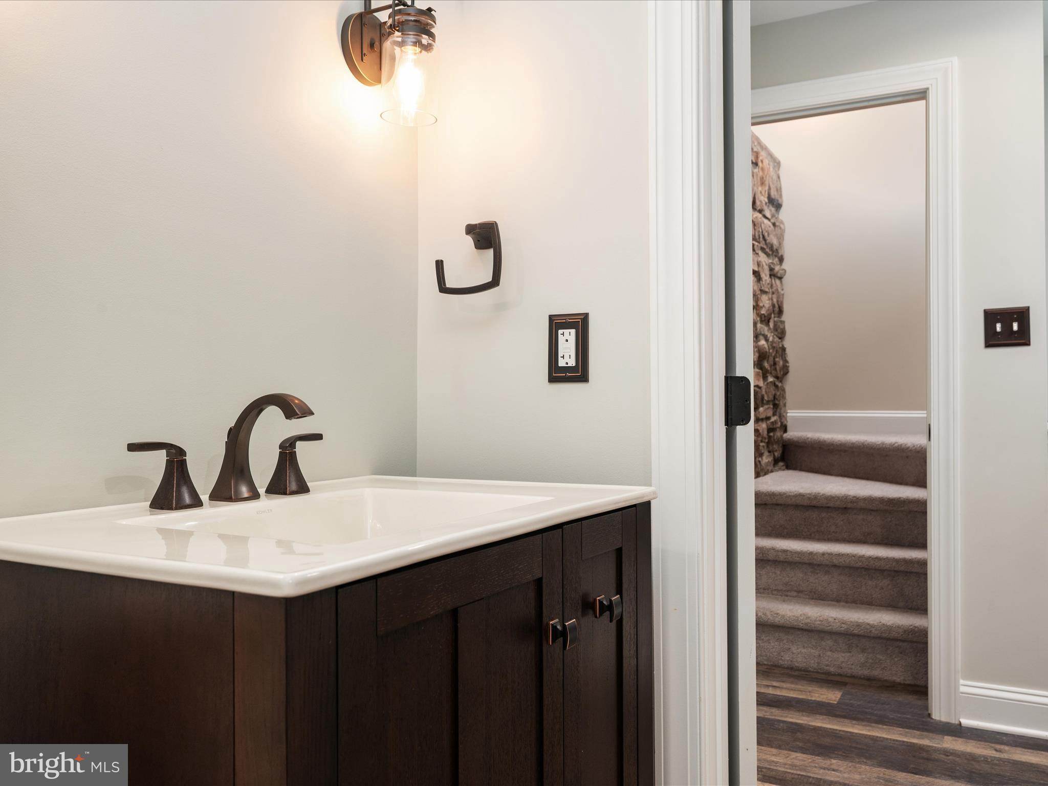 23 Elm Road Riva, MD 21140 - Photo 34 of 66 a bathroom with a sink vanity and a mirror