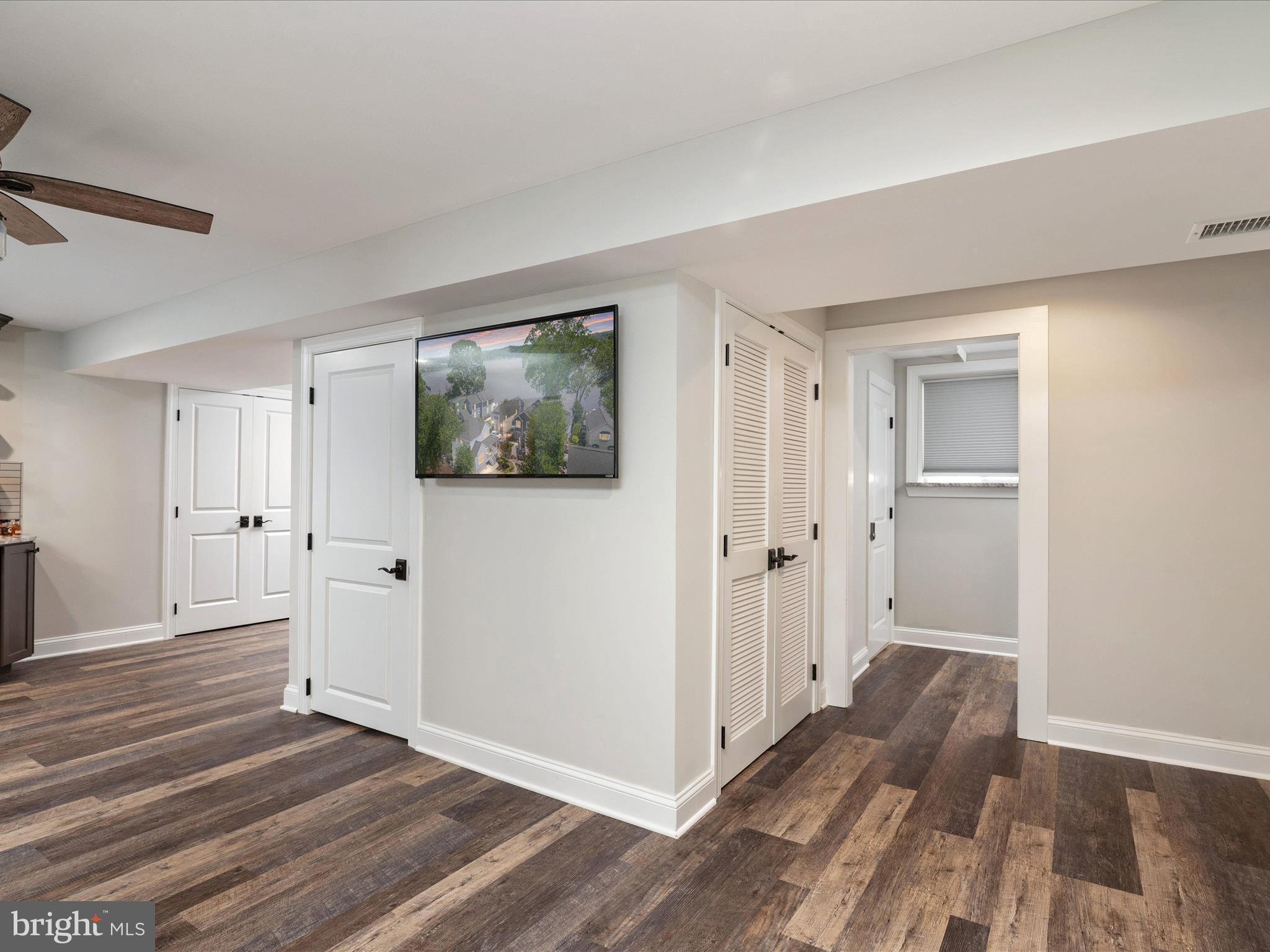 23 Elm Road Riva, MD 21140 - Photo 37 of 66 a view of a hallway with wooden floor and closet area