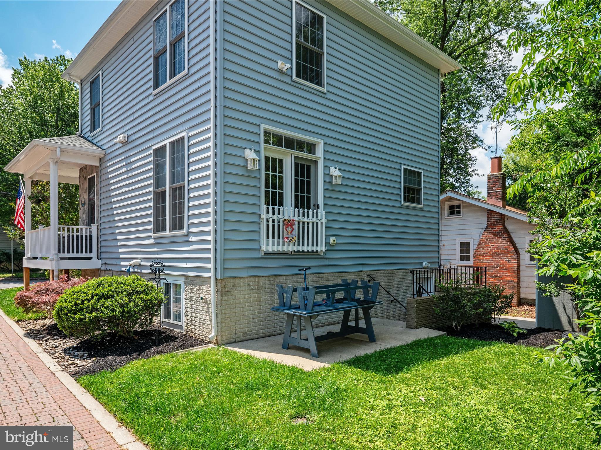 23 Elm Road Riva, MD 21140 - Photo 41 of 66 a house view with a sitting space and garden