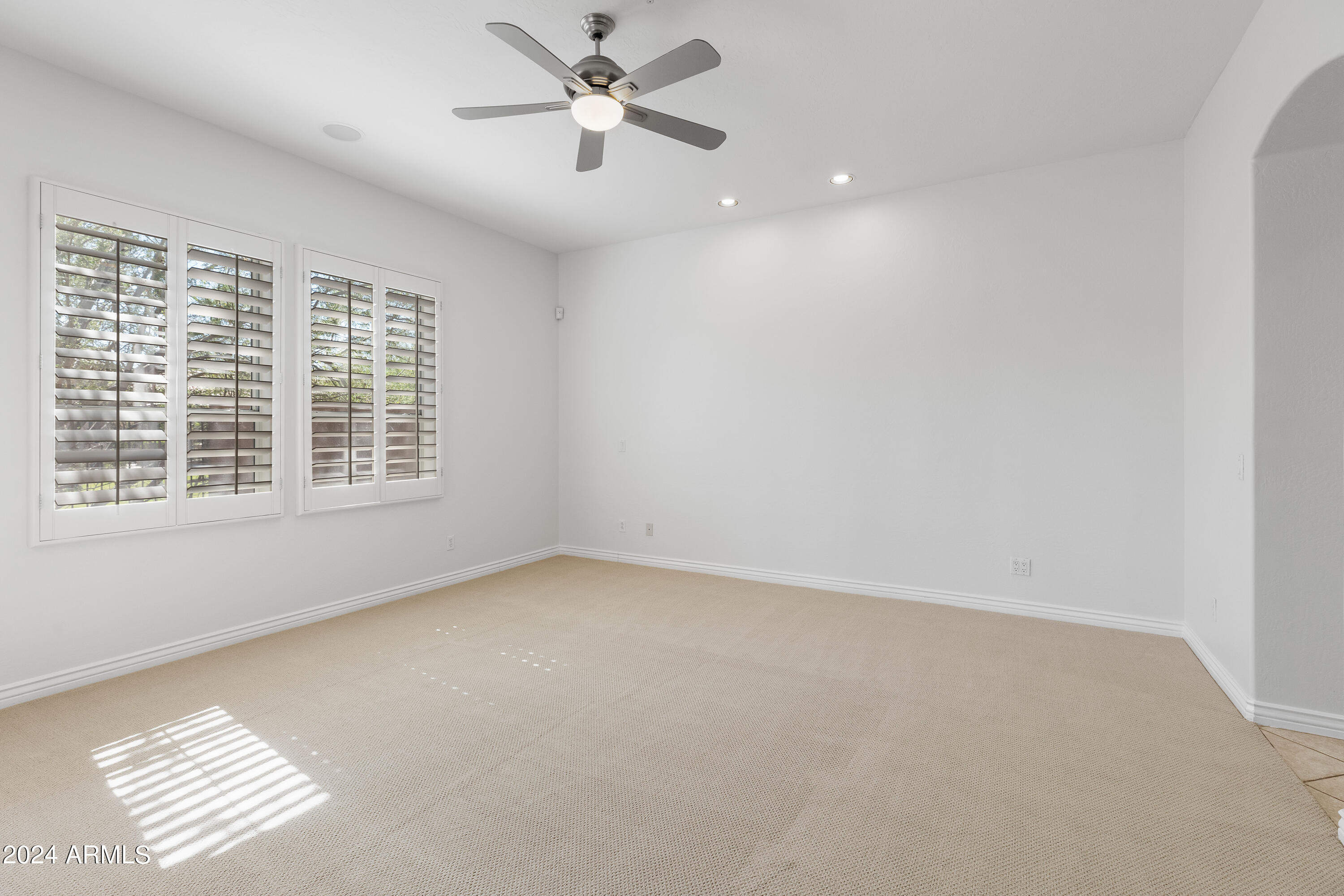 8883 East Mountain Spring Road Scottsdale, AZ 85255 - Photo 18 of 48 a view of an empty room with a window