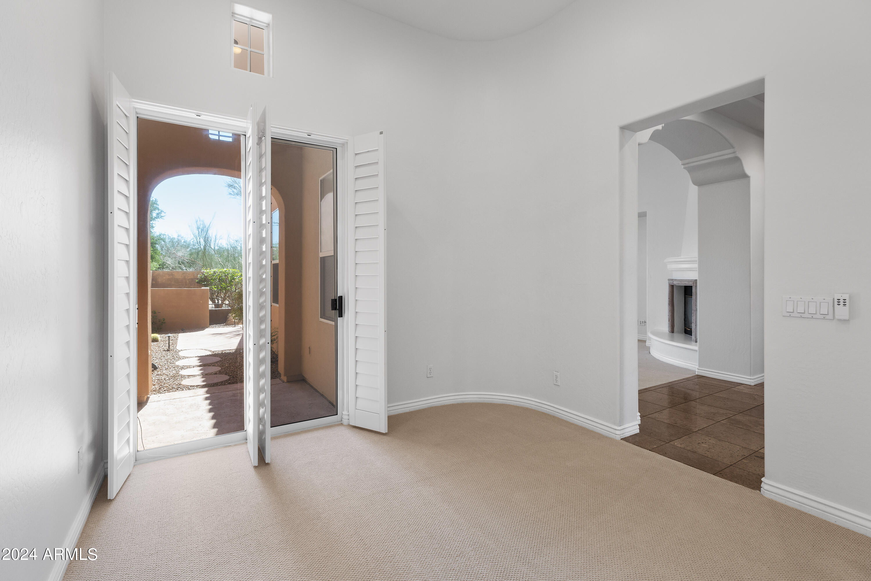 8883 East Mountain Spring Road Scottsdale, AZ 85255 - Photo 24 of 48 a view of an empty room and window