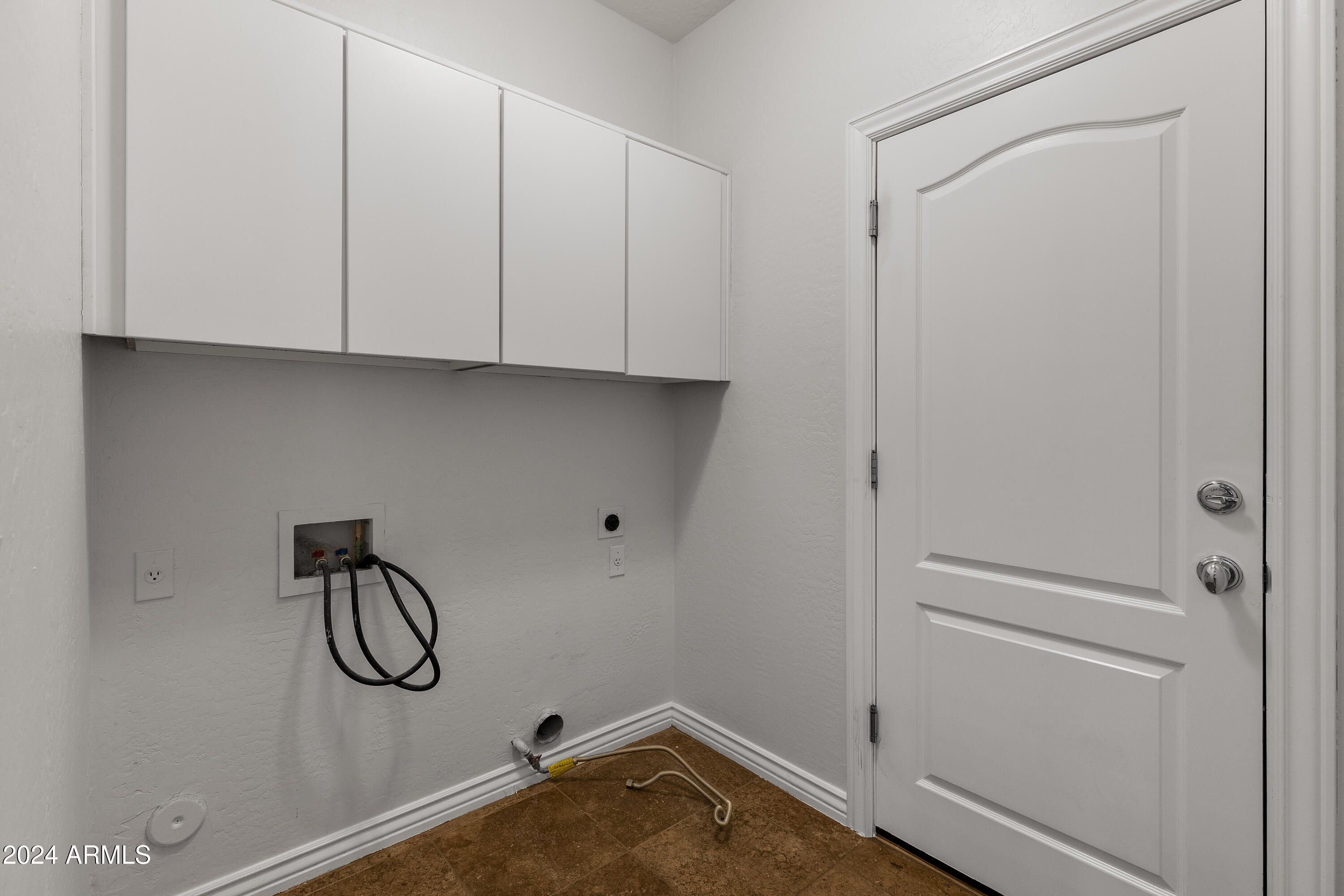 8883 East Mountain Spring Road Scottsdale, AZ 85255 - Photo 27 of 48 a view of a storage & utility room with racks on the wall