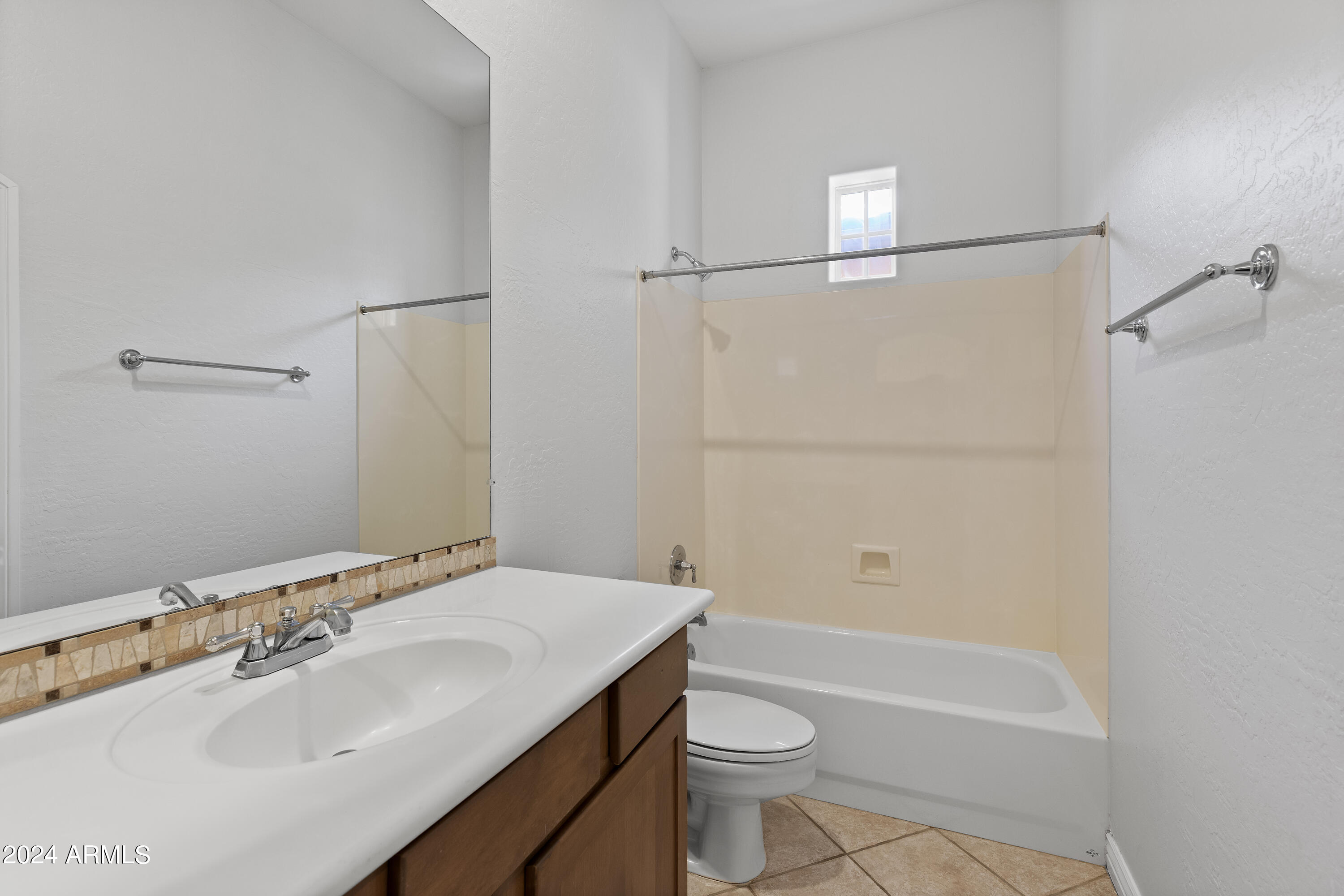 8883 East Mountain Spring Road Scottsdale, AZ 85255 - Photo 33 of 48 a bathroom with a sink toilet and shower