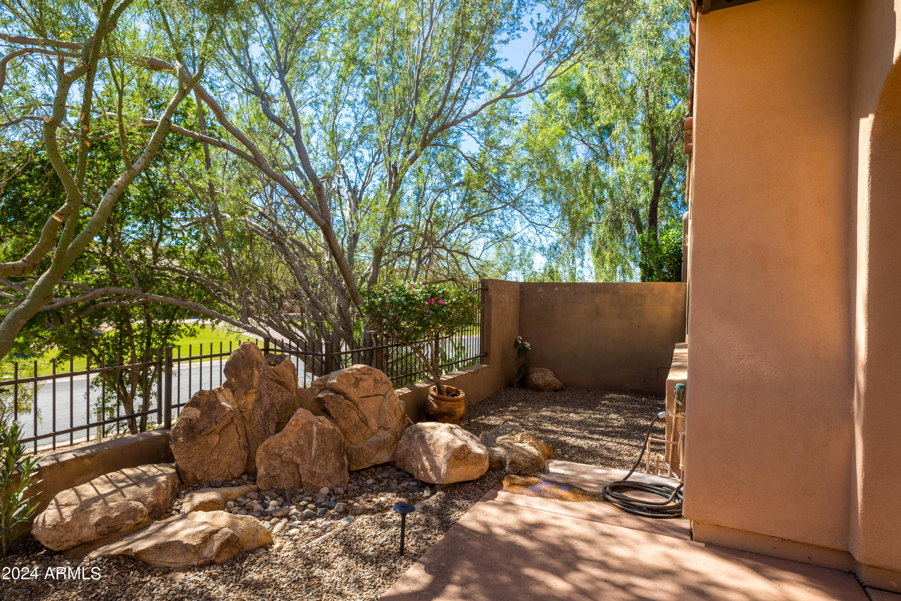 8883 East Mountain Spring Road Scottsdale, AZ 85255 - Photo 36 of 48 a view of a backyard