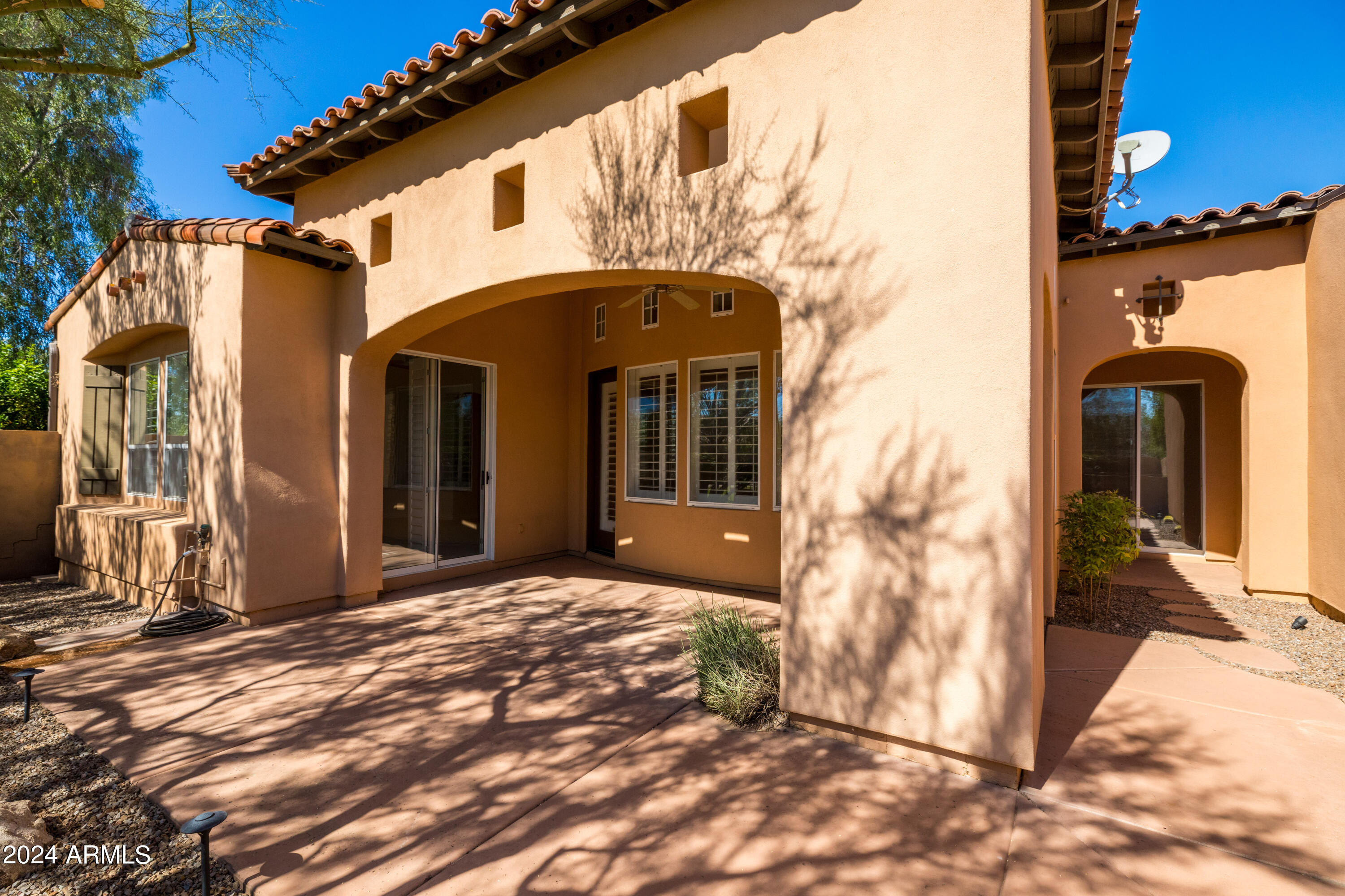 8883 East Mountain Spring Road Scottsdale, AZ 85255 - Photo 38 of 48 a front view of a house with a porch
