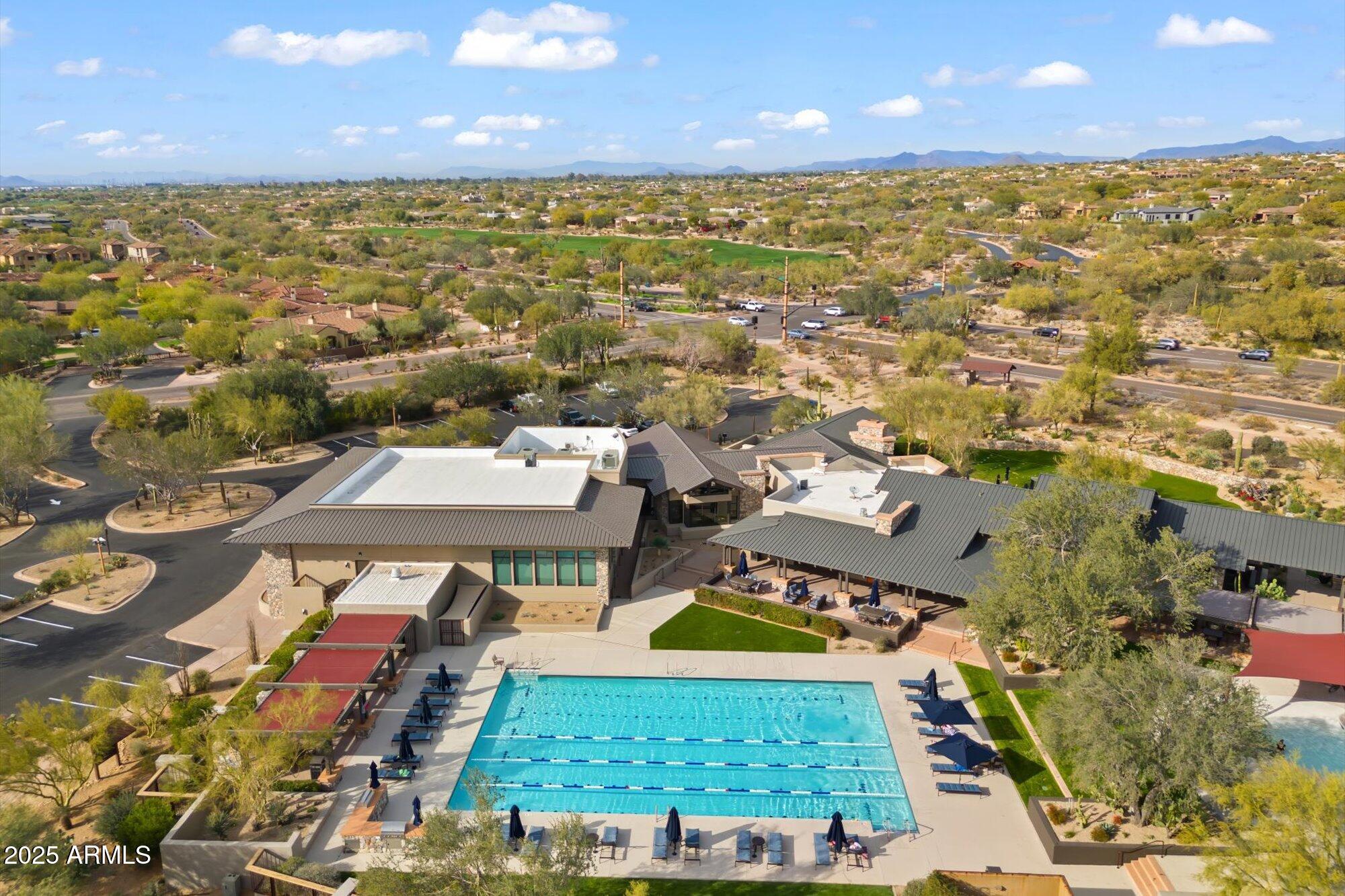 8883 East Mountain Spring Road Scottsdale, AZ 85255 - Photo 44 of 48 an aerial view of residential houses with outdoor space