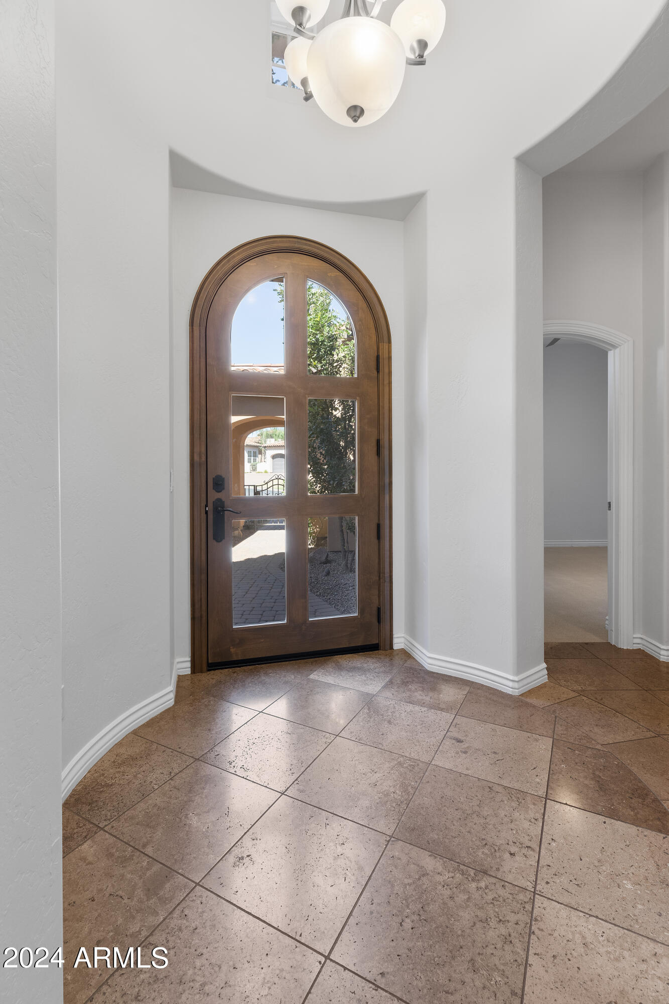8883 East Mountain Spring Road Scottsdale, AZ 85255 - Photo 7 of 48 a view of an entryway with a livingroom