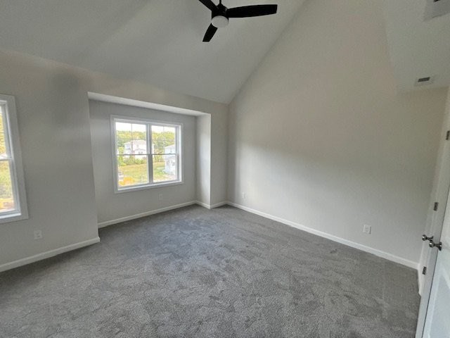7 Ambrose Way, Unit 5 Shirley, MA 01464 - Photo 15 of 16 an empty room with windows and ceiling fan view