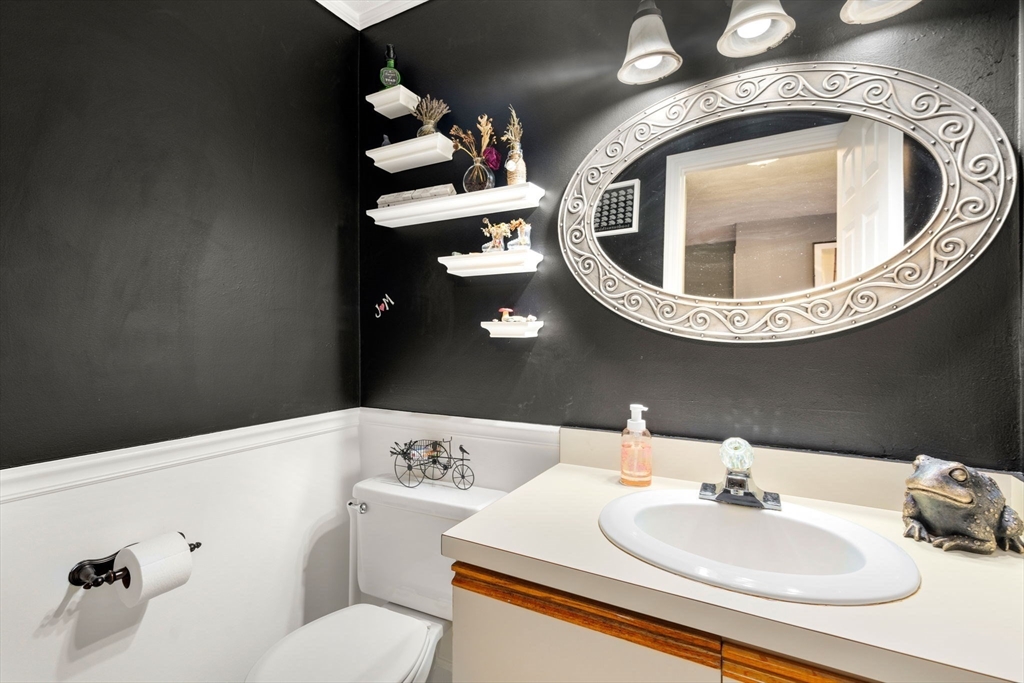 12 Oak Ridge Drive, Unit 3 Maynard, MA 01754 - Photo 14 of 34 a bathroom with a toilet and a sink