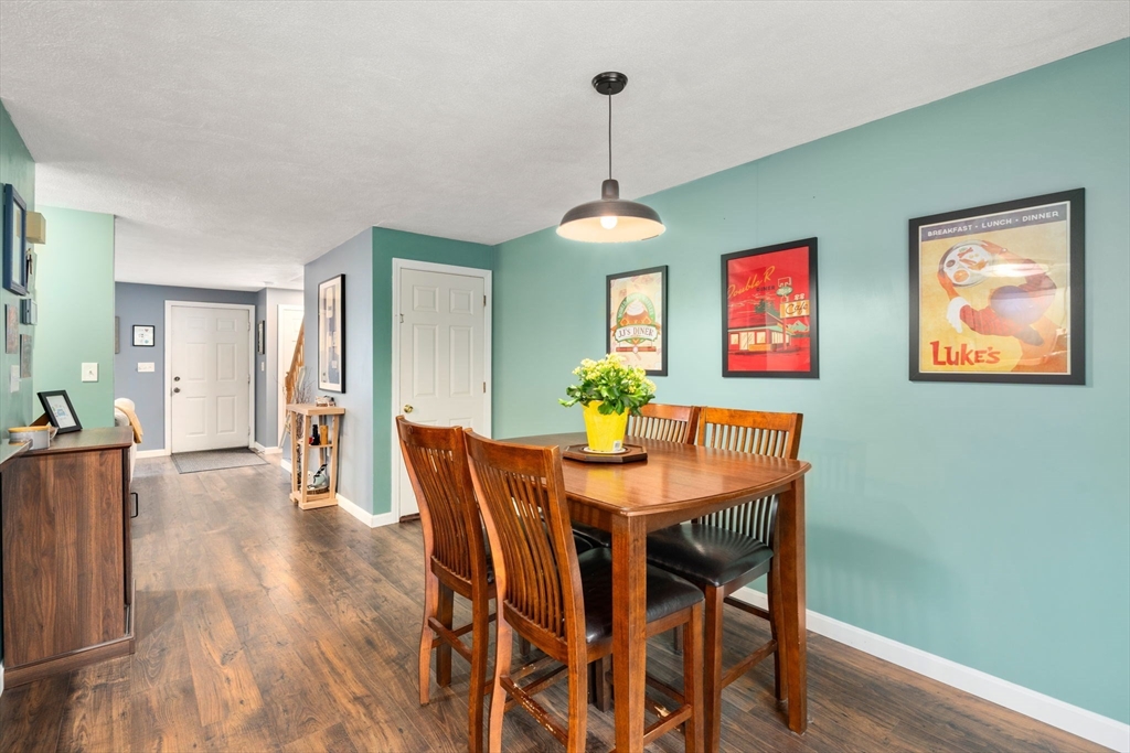 12 Oak Ridge Drive, Unit 3 Maynard, MA 01754 - Photo 9 of 34 a view of a dining room with furniture window and wooden floor
