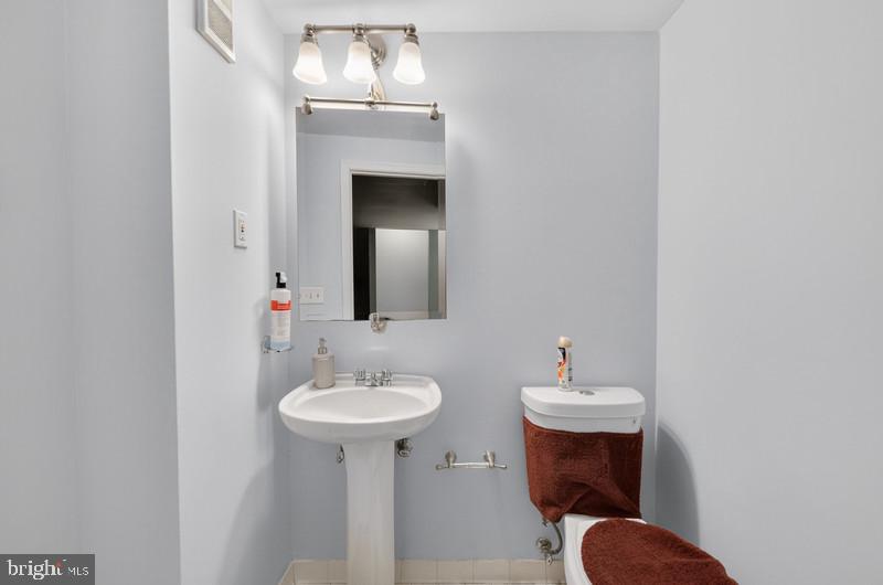 9303 Ispahan Loop Laurel, MD 20708 - Photo 24 of 27 Basement half bathroom