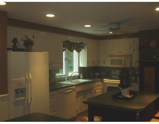 30 Blacksmith Road Wilbraham, MA 01095 - Photo 4 of 7 a bathroom with a sink and a mirror