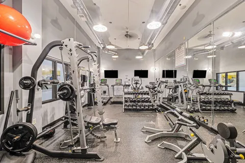 a view of a room with gym equipment