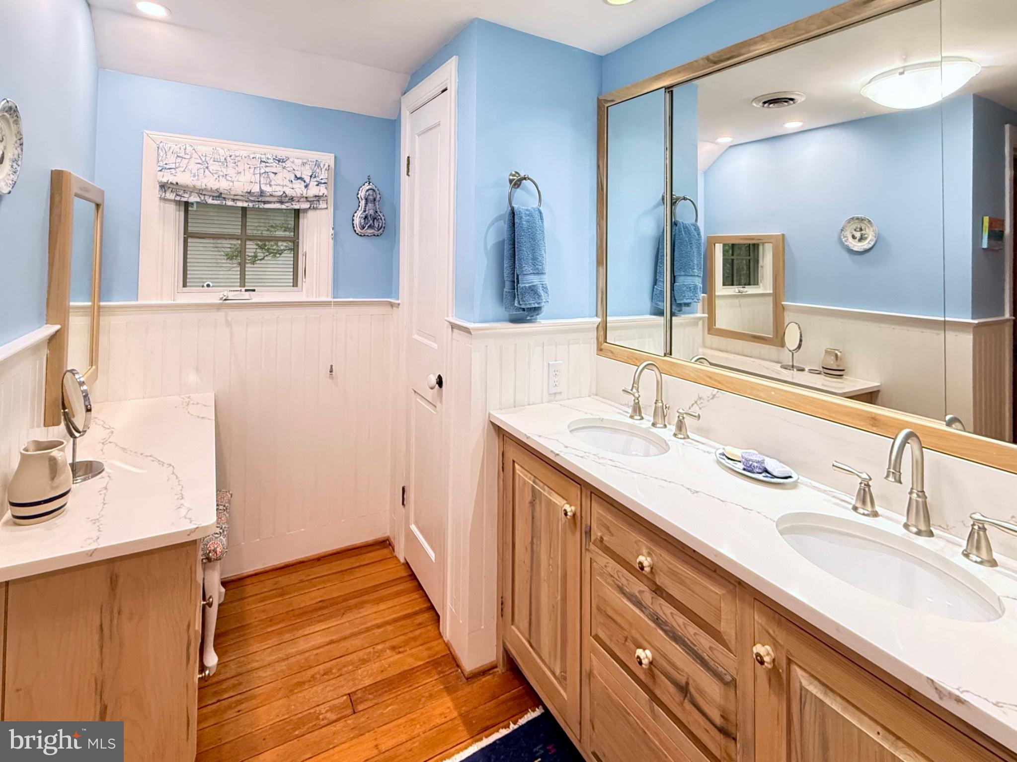 700 South Talbot Street St. Michaels, MD 21663 - Photo 65 of 83 Double sinks & linen closet on right.