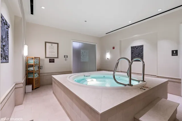 a view of living room filled with furniture and window