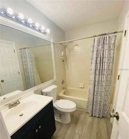 a view of two chairs in the balcony