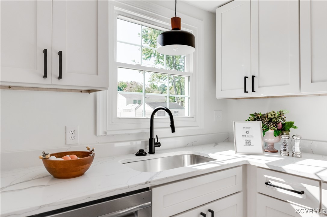 1905 Reagan Road Henrico, VA 23228 - Photo 16 of 41 Kitchen with white cabinetry, sink, dishwasher, li