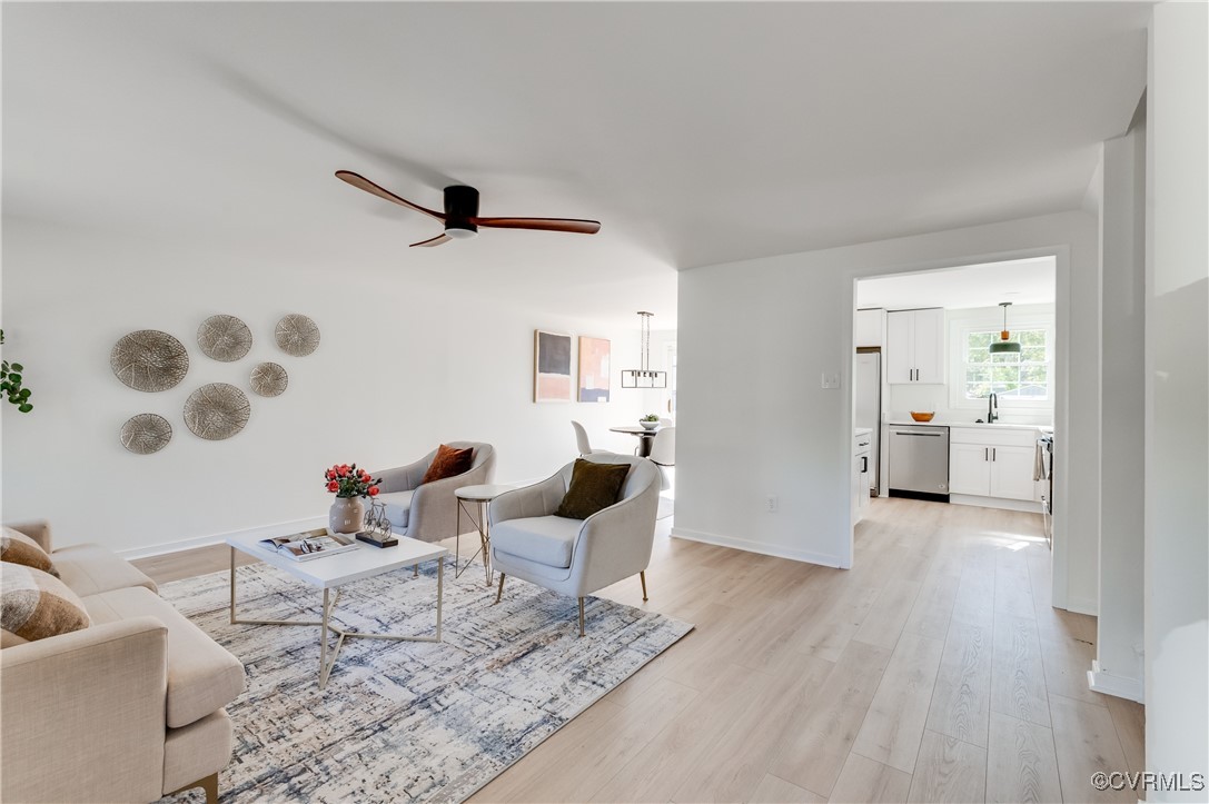 1905 Reagan Road Henrico, VA 23228 - Photo 2 of 41 Living room featuring ceiling fan, light hardwood