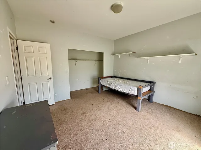 a view of a kitchen from the hallway