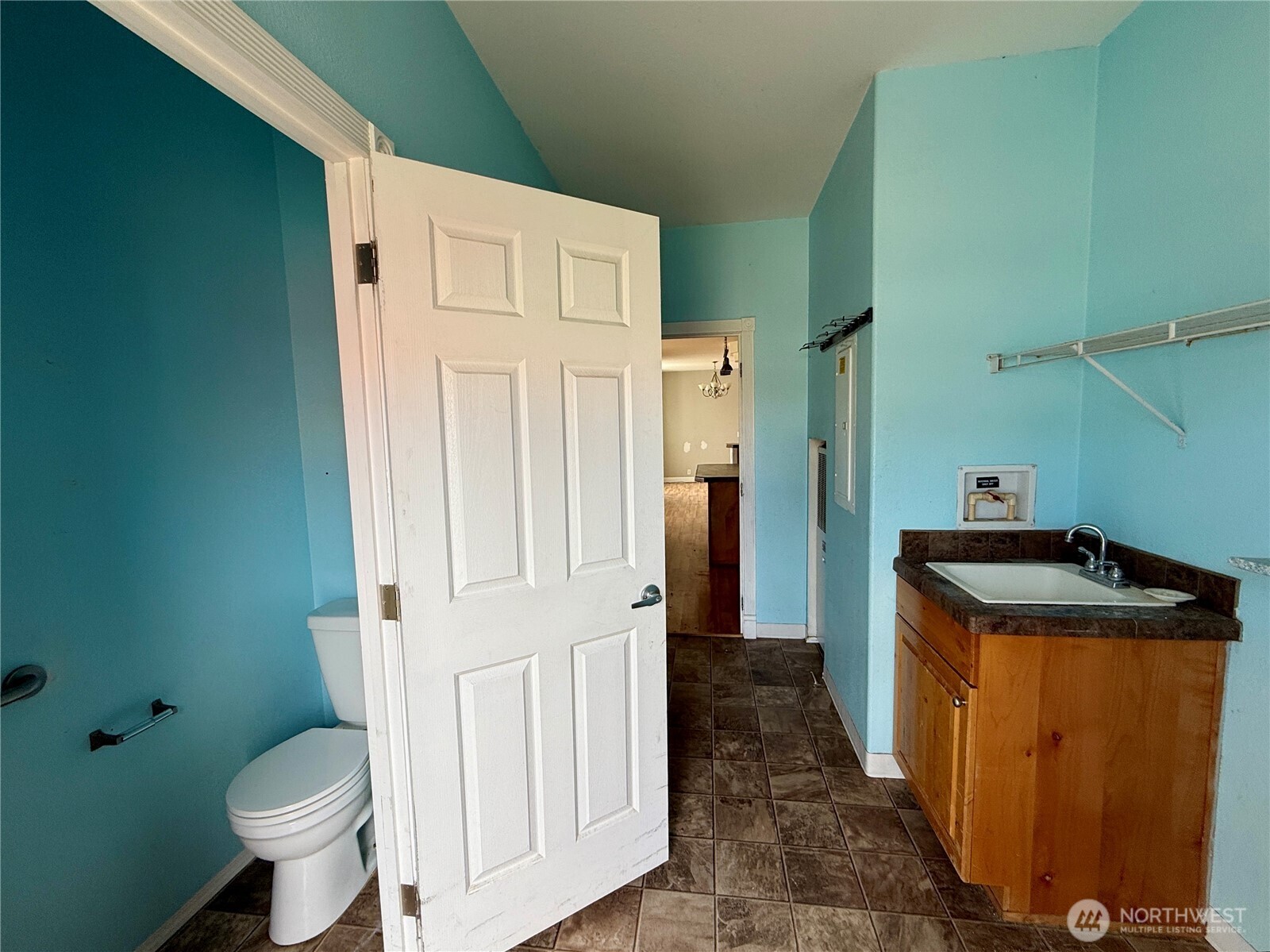 110 Main Road Dayton, WA 99328 - Photo 17 of 36 a bathroom with a granite countertop sink and a toilet