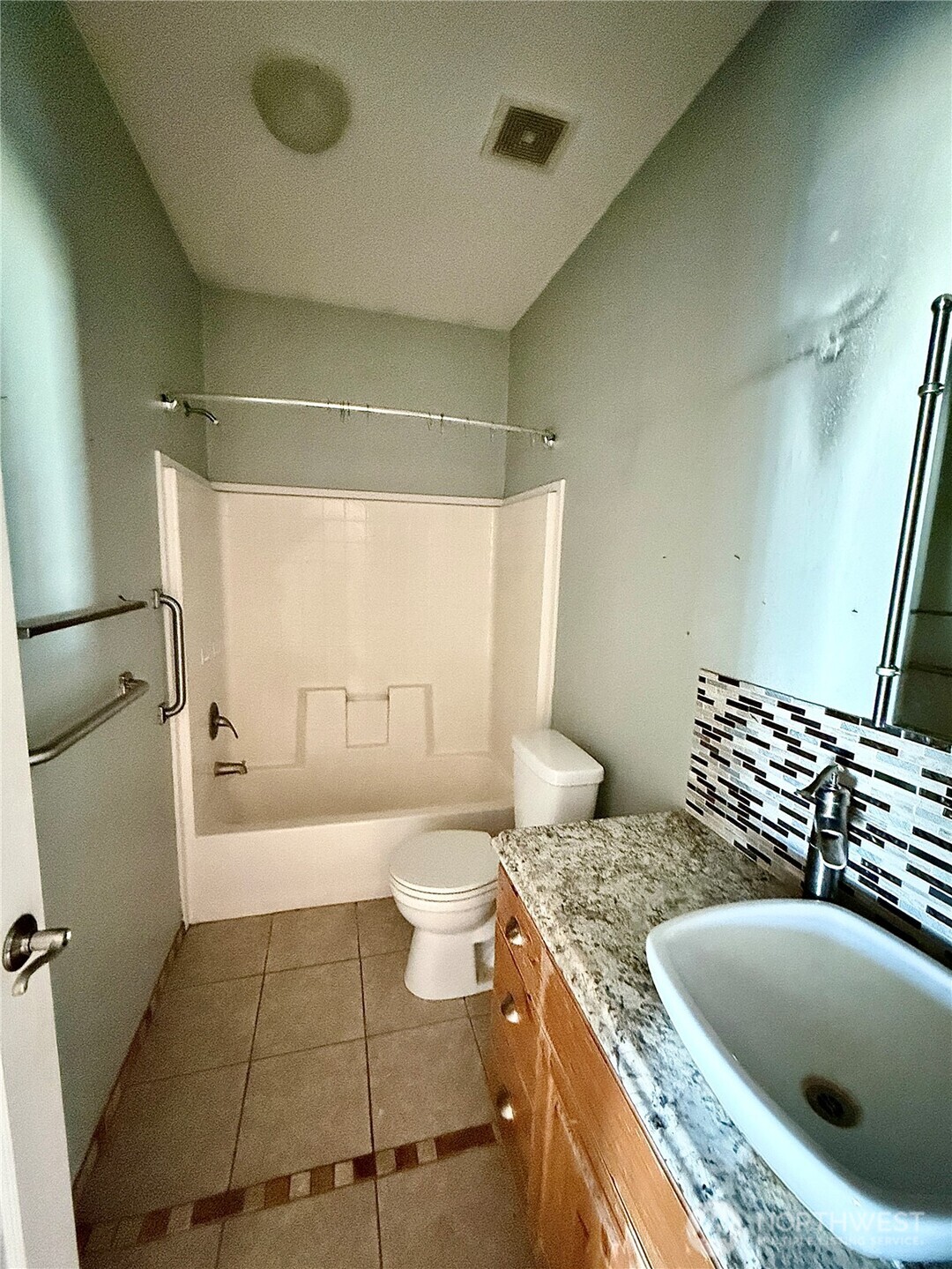 110 Main Road Dayton, WA 99328 - Photo 19 of 36 a bathroom with a granite countertop sink a toilet and bathtub