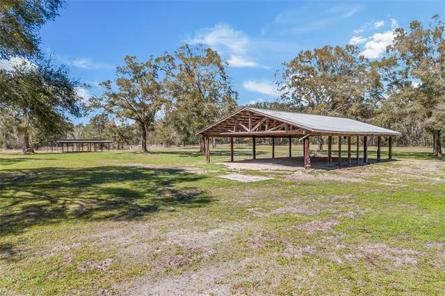 a view of a building with a yard