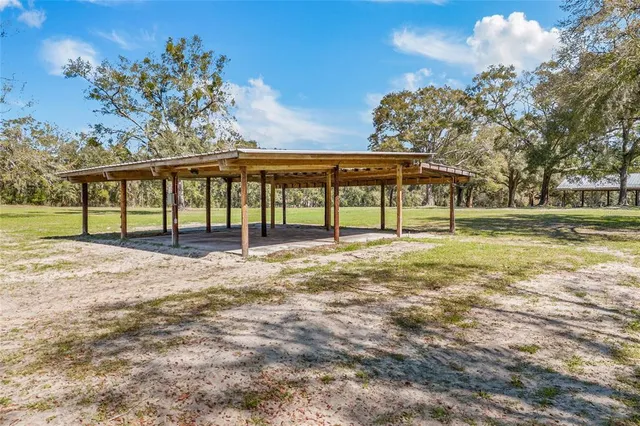 a view of a yard with an trees