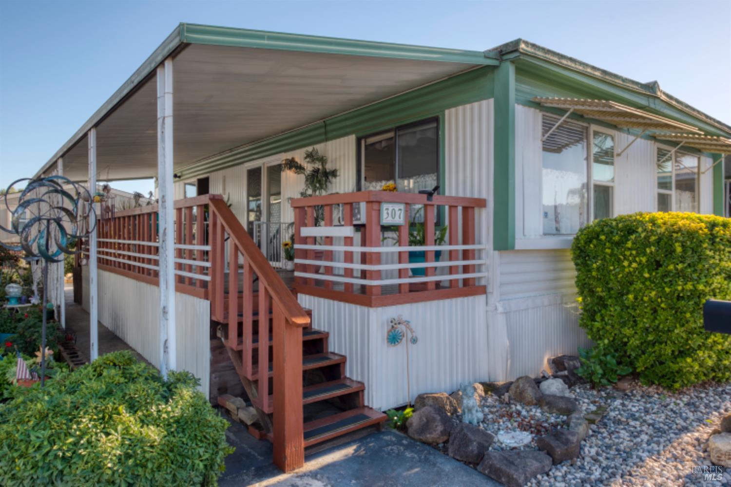 a front view of house with street