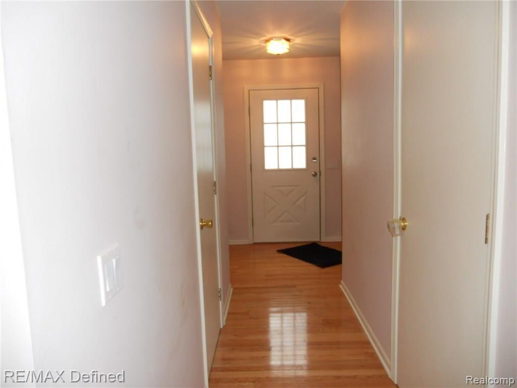 747 Cardinal Court Howell, MI 48843 - Photo 2 of 25 Spacious entryway with beautiful hardwood flooring