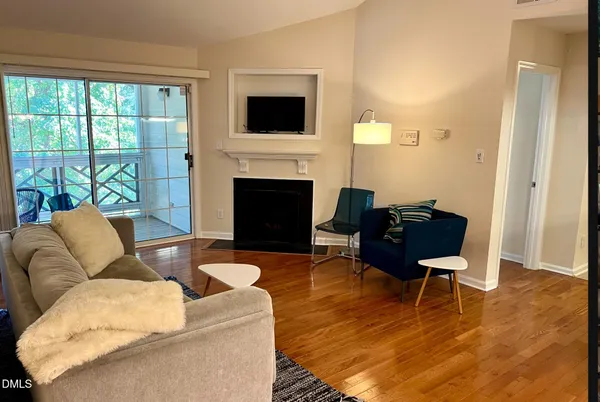 a living room with furniture or fireplace and a flat screen tv