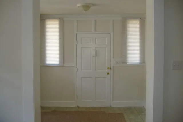 an empty room with windows