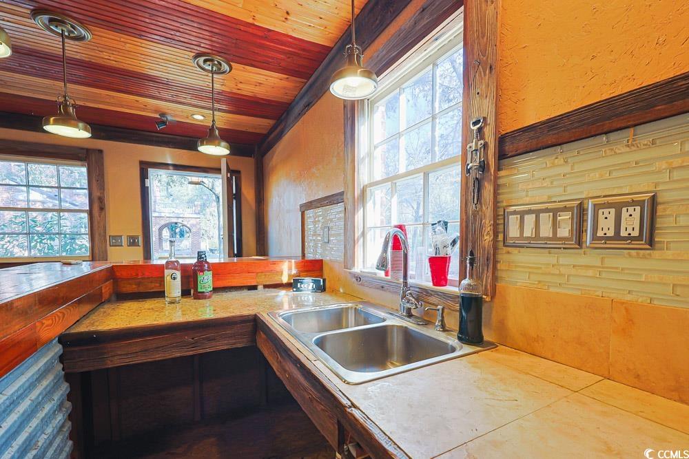 509 Beaty Street Conway, SC 29526 - Photo 30 of 40 Kitchen with decorative light fixtures, light countertops, and wooden ceiling
