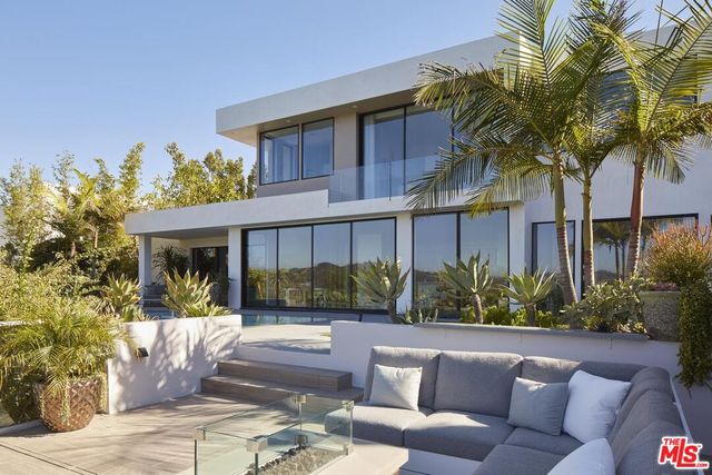 a view of a house with a patio